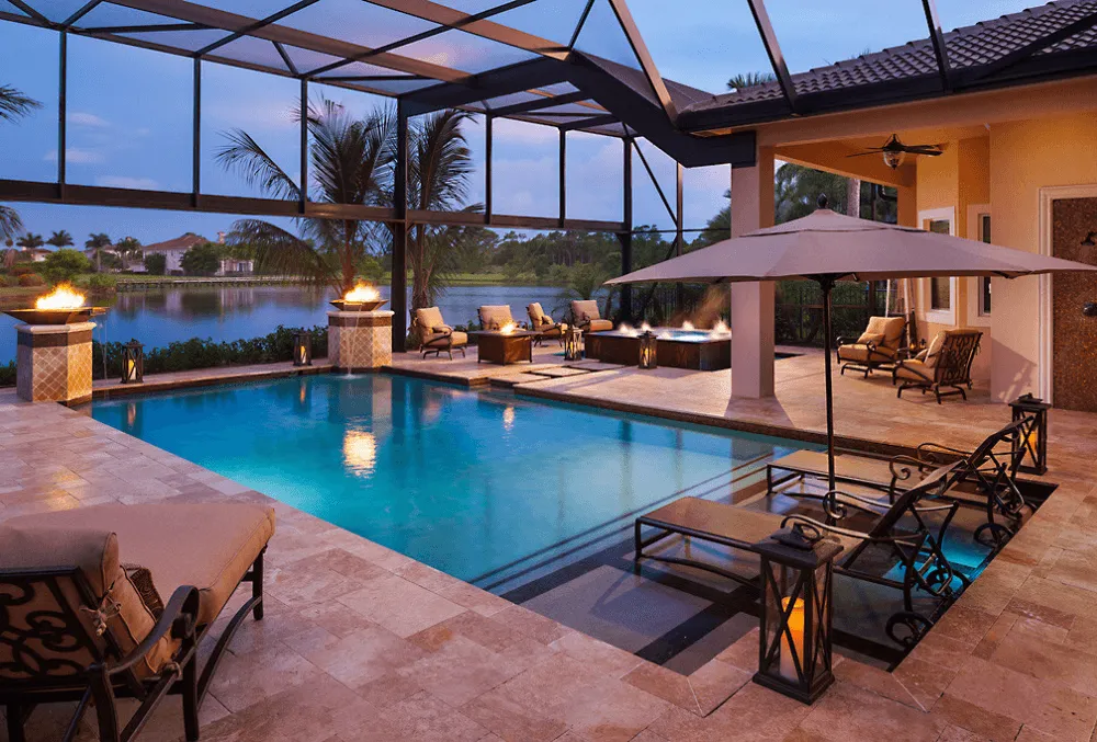 trendy pool deck with lamps and pergola